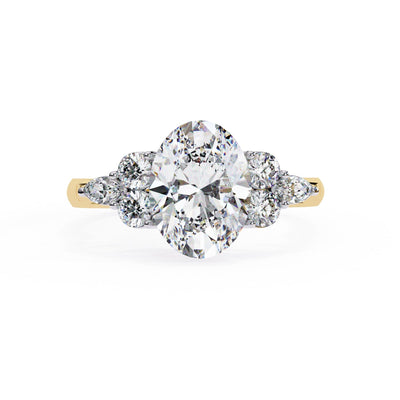 Diamond ring with gold band on a white background
