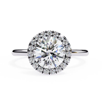 Diamond ring with a clear gemstone on a white background