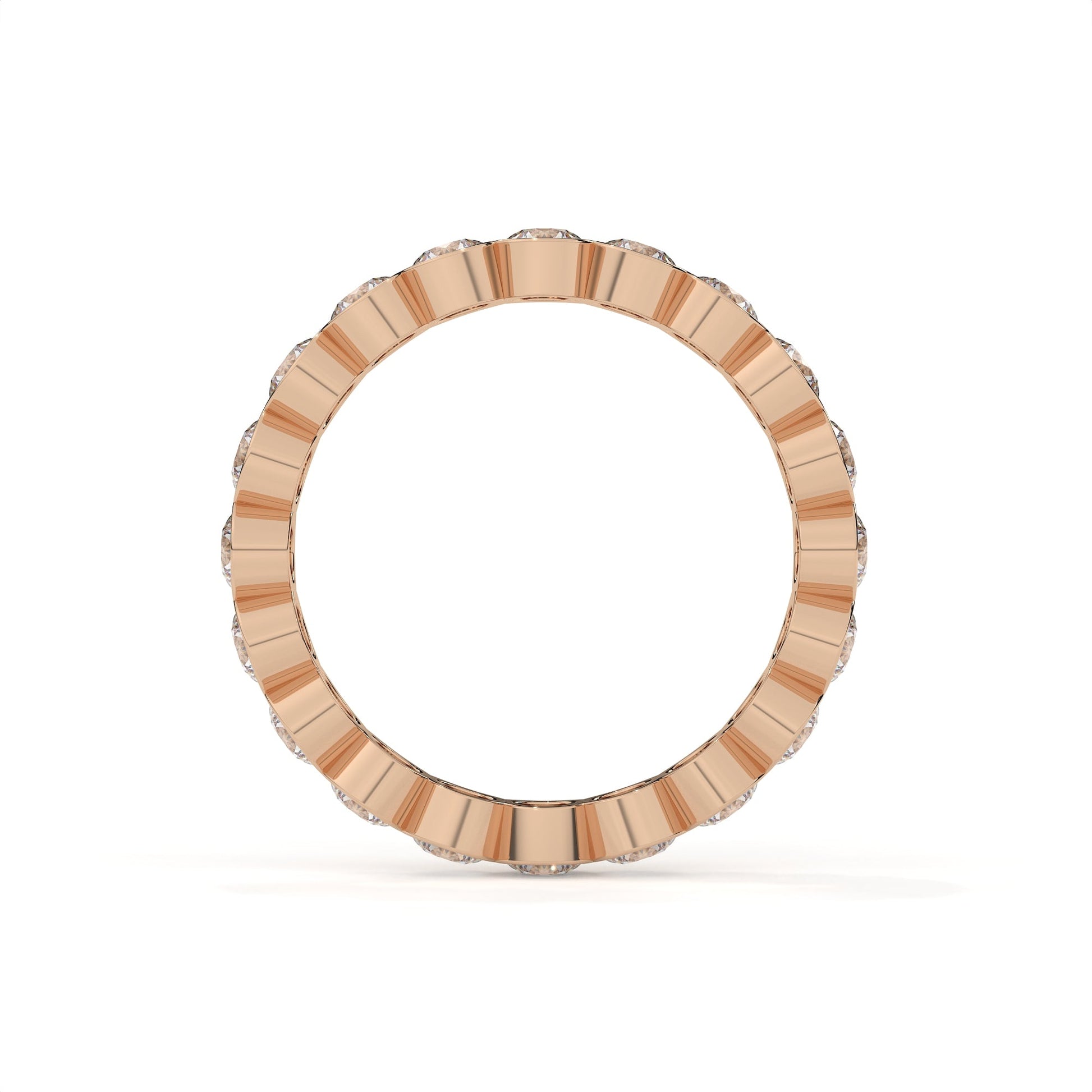 Gold ring with a textured band on a white background