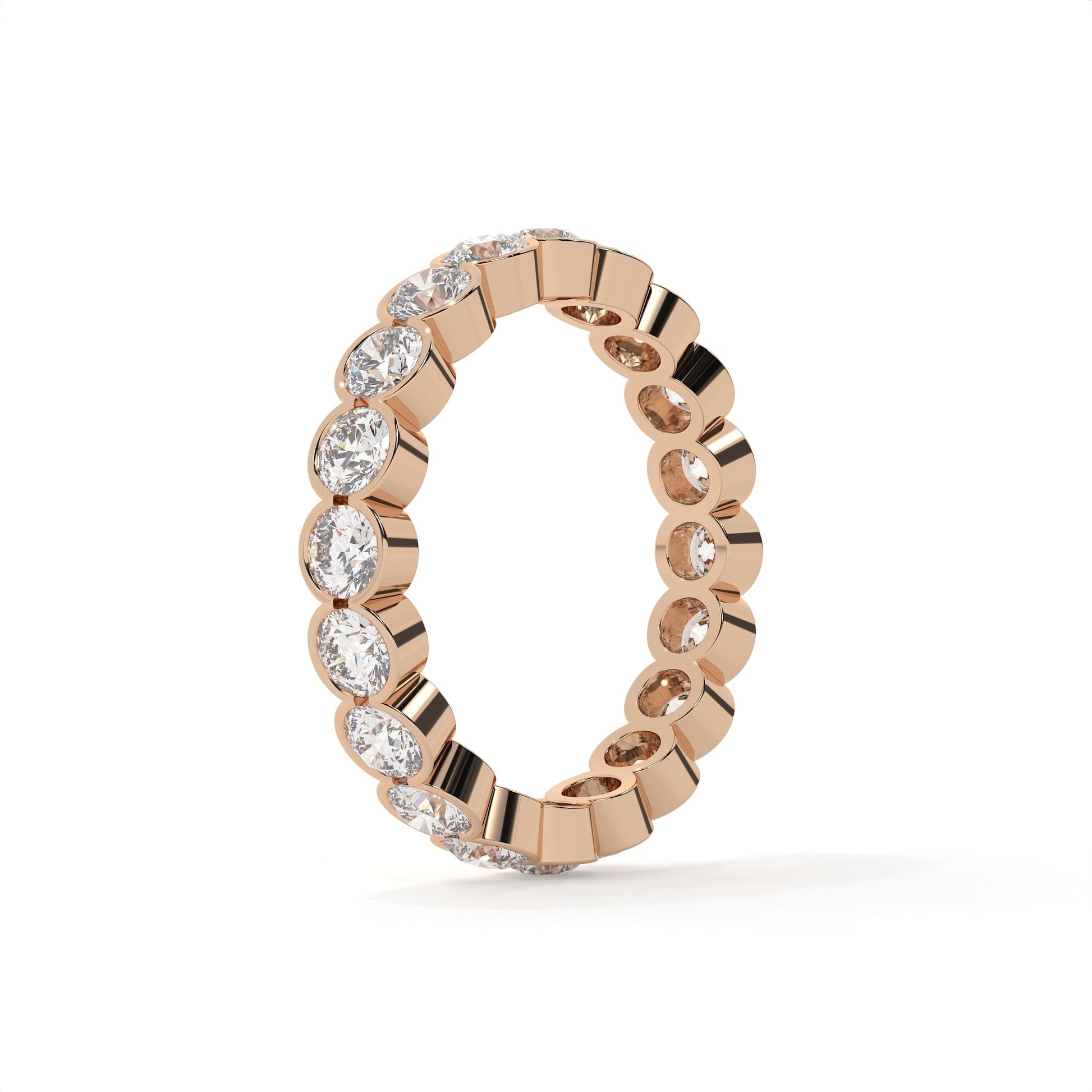 Rose gold ring with diamonds on a white background