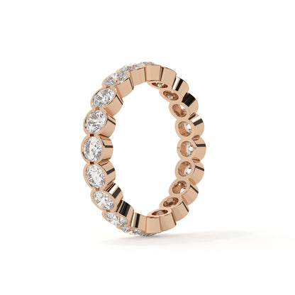 Rose gold ring with diamonds on a white background