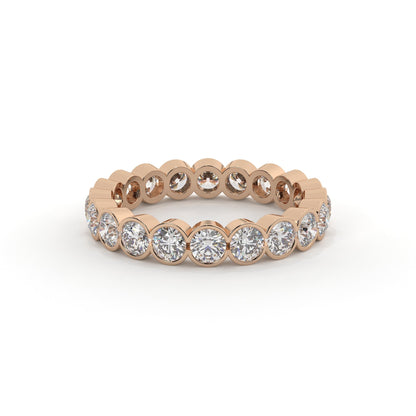 Rose gold ring with diamonds on a white background