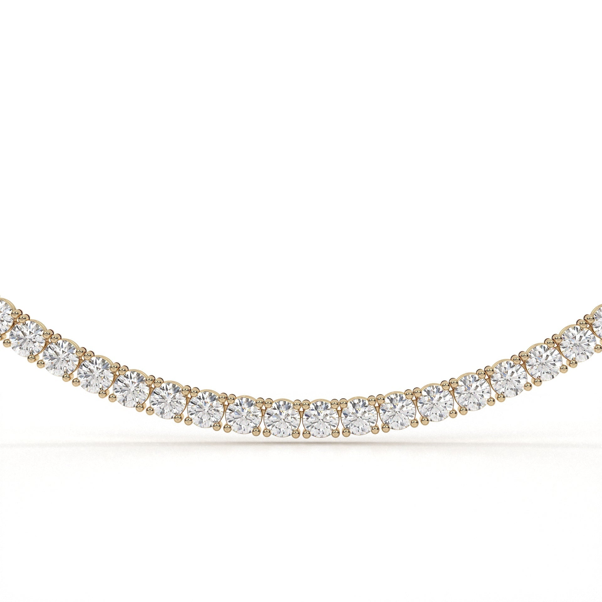 Gold and diamond necklace on a white background