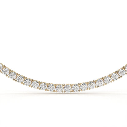 Gold and diamond necklace on a white background