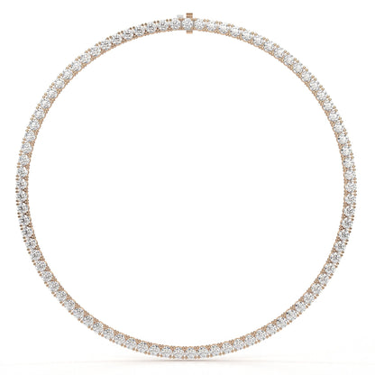 Rose gold necklace with diamonds on a white background
