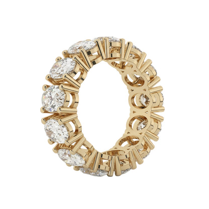 Gold ring with diamonds on a white background