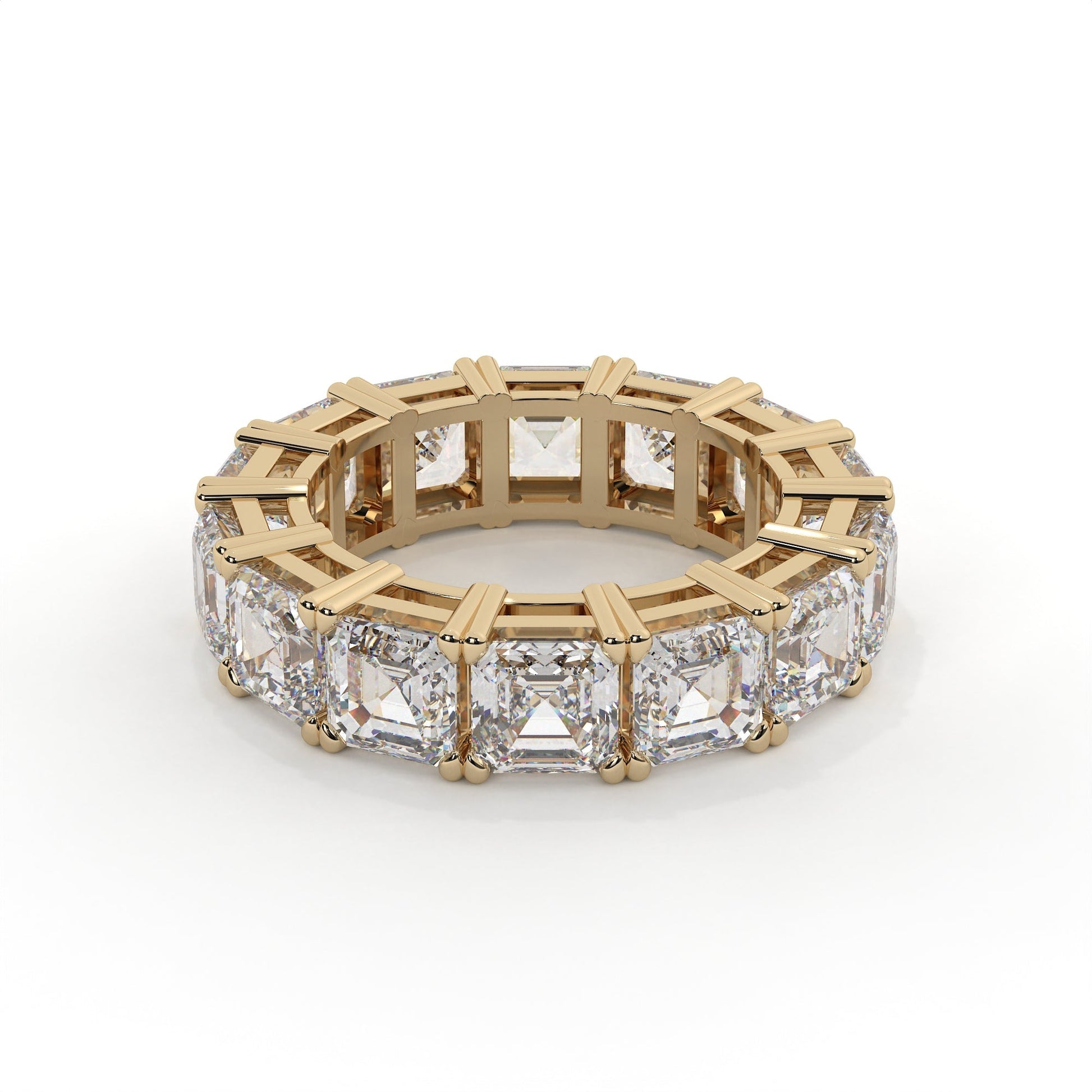 Gold ring with diamond accents on a white background