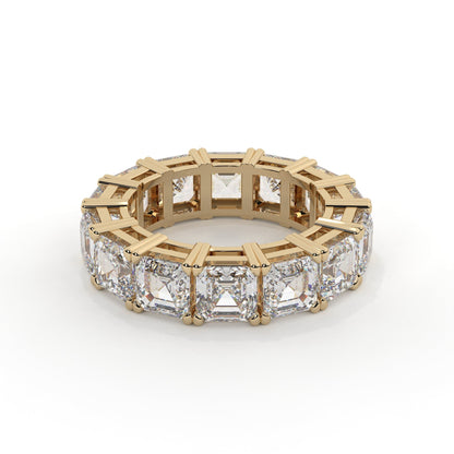 Gold ring with diamond accents on a white background