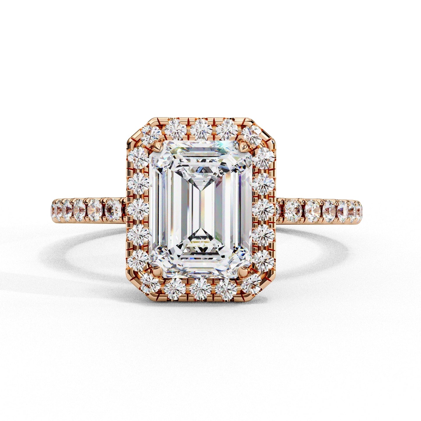 Diamond ring with rose gold setting on a white background