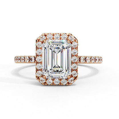 Diamond ring with rose gold setting on a white background