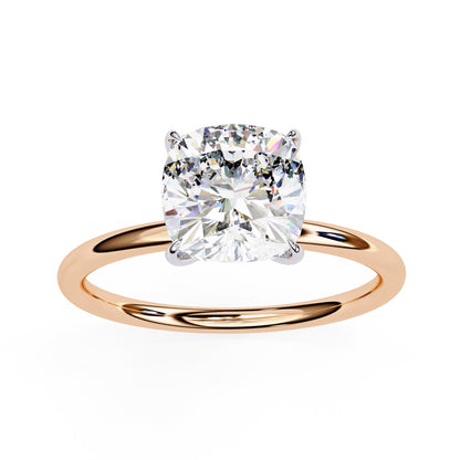 Rose gold ring with a large diamond on a white background