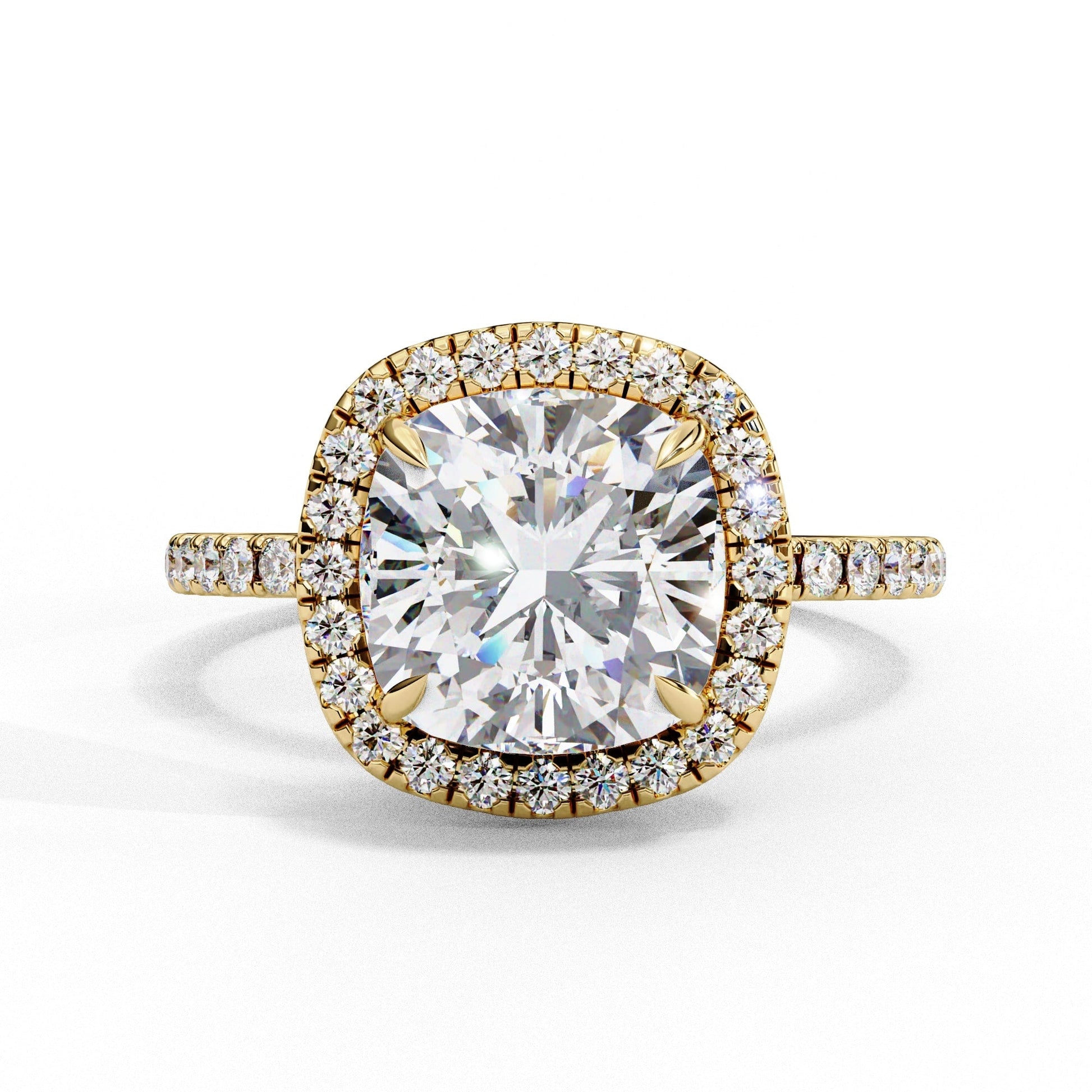 Gold ring with a large diamond and smaller diamonds around on a white background