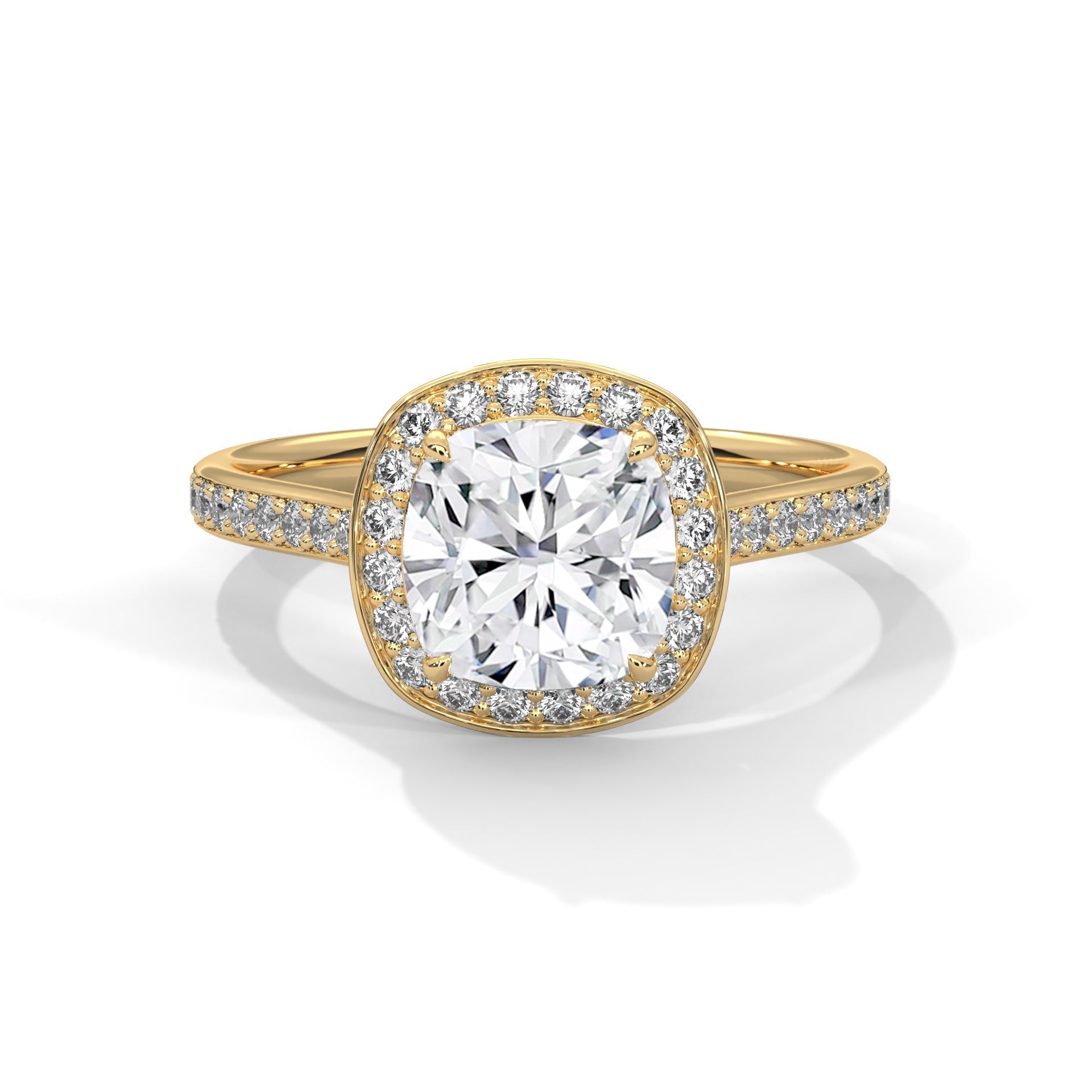 Gold ring with a large diamond and smaller diamonds on the band against a white background