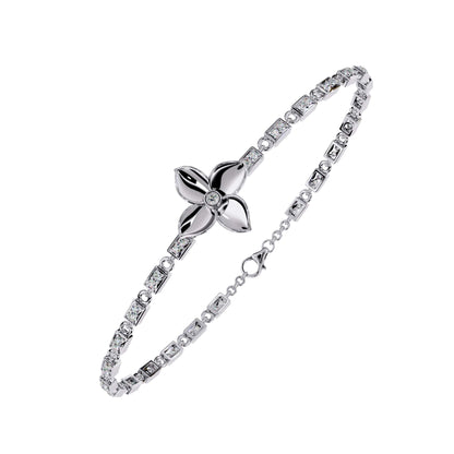 White gold bracelet with a floral clasp on a white background