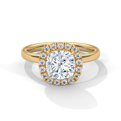 Gold ring with a large diamond and smaller diamonds around on a white background