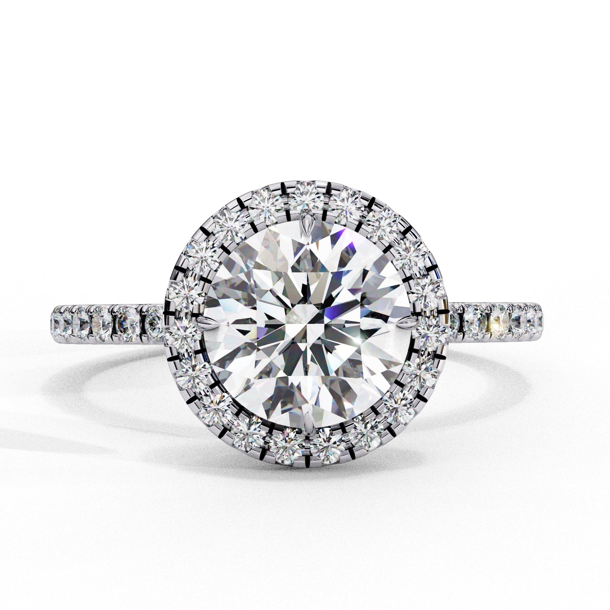 Diamond ring with a large central gemstone and smaller stones on a white background