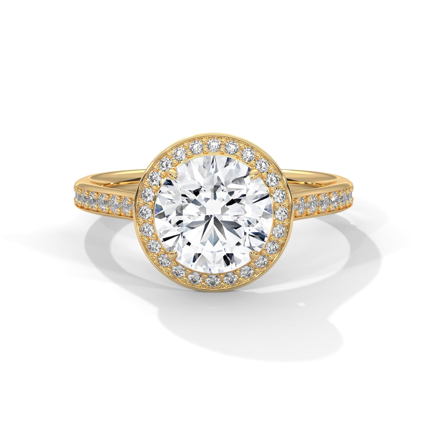 Gold ring with a large diamond and smaller diamonds on the band against a white background