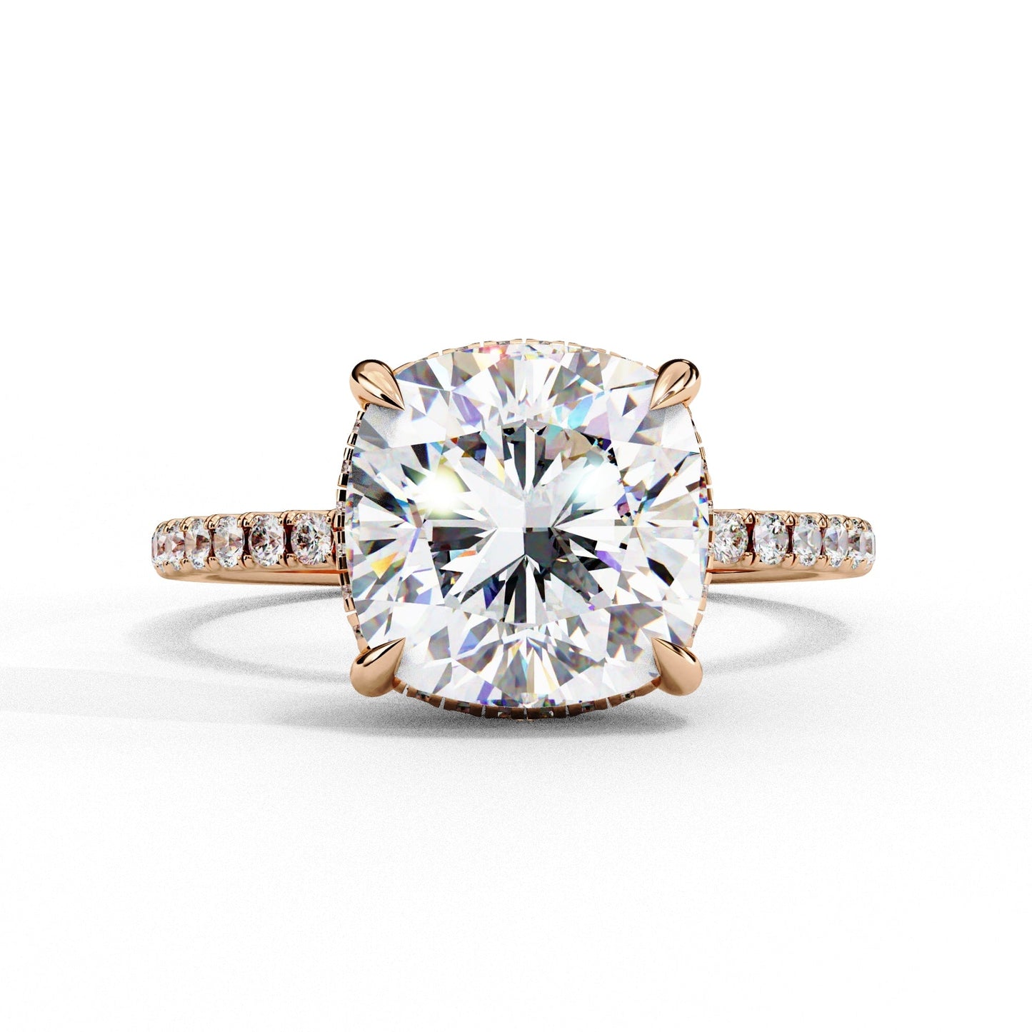 Diamond ring with rose gold band on a white background
