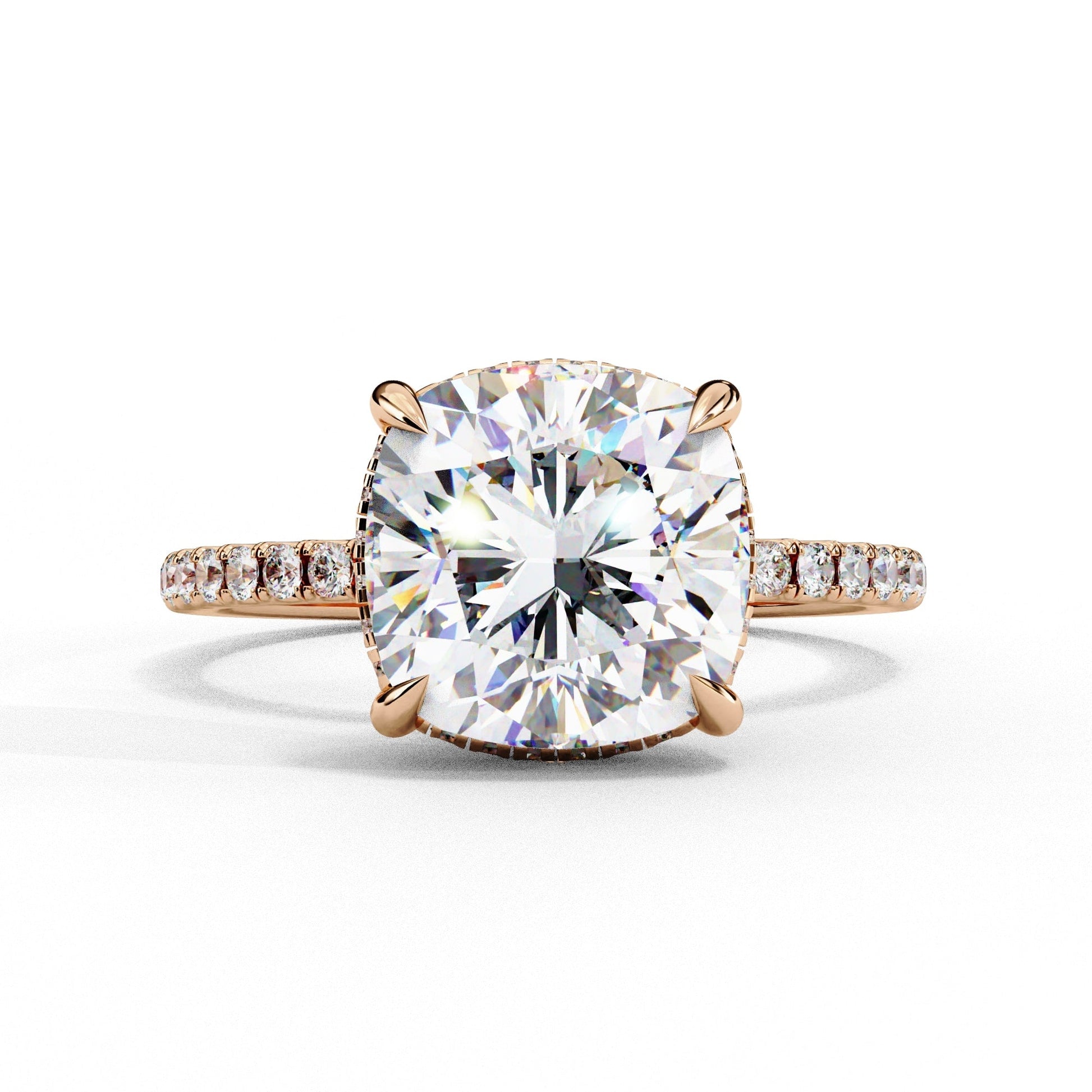 Diamond ring with rose gold band on a white background