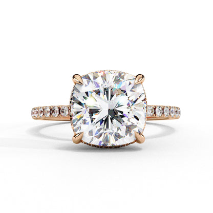 Diamond ring with rose gold band on a white background
