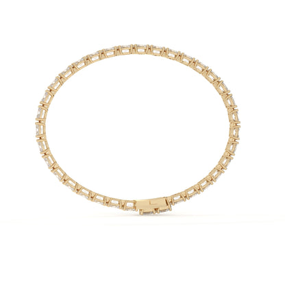 Gold bracelet on a white background