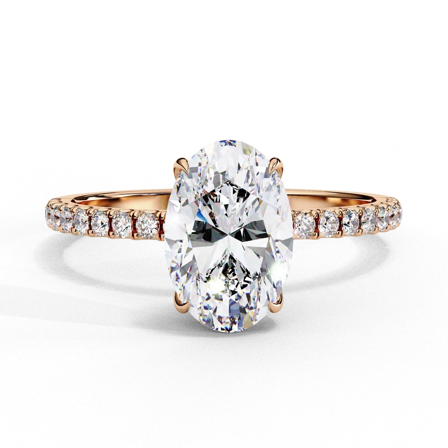 Rose gold ring with a large diamond and smaller diamonds on the band against a white background