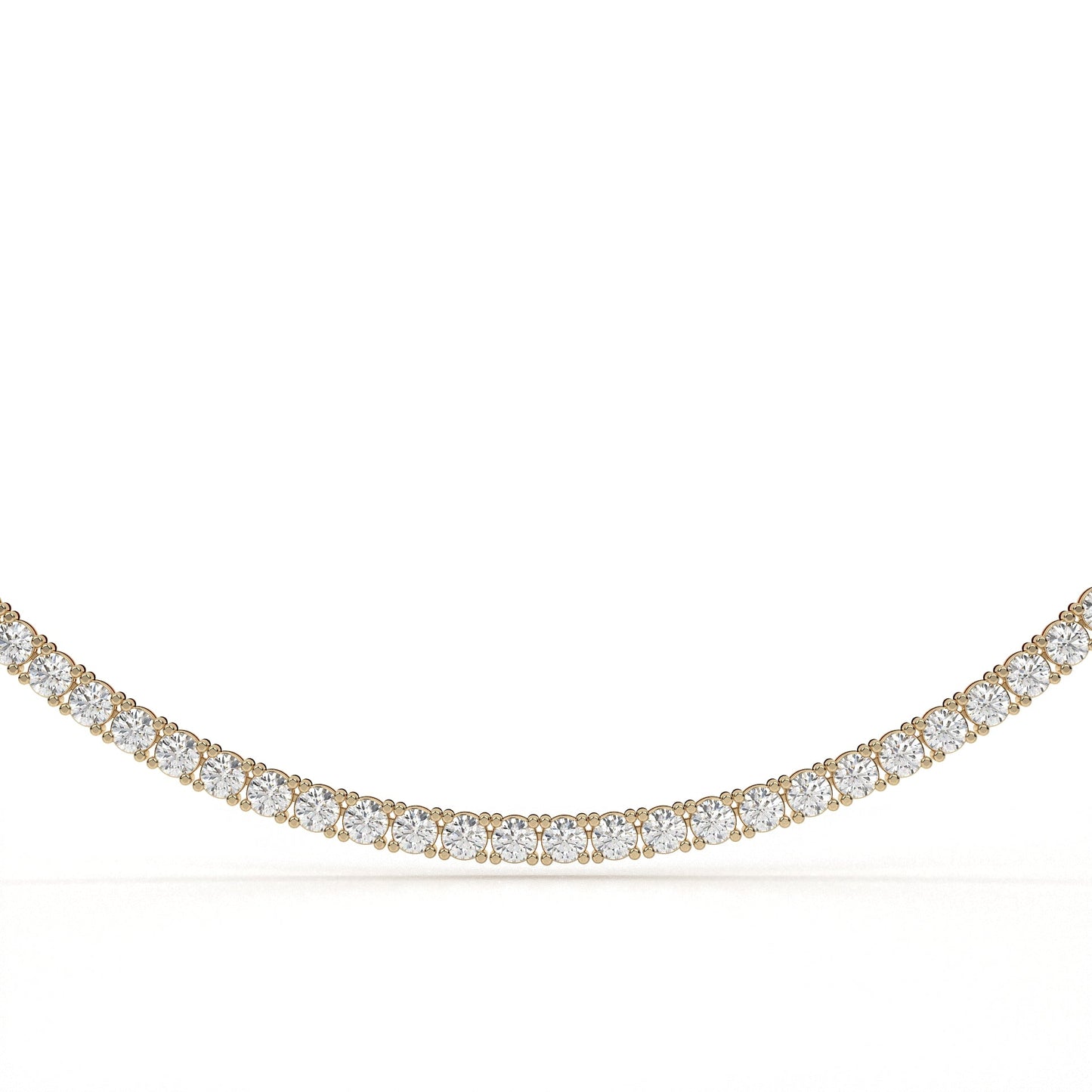 Gold necklace with diamonds on a white background