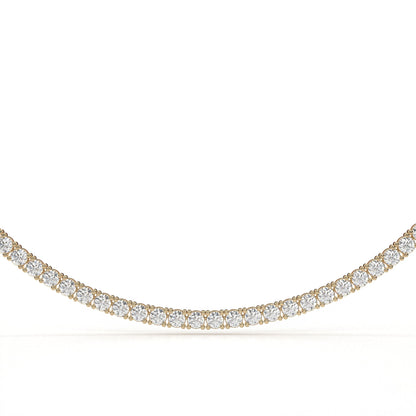 Gold necklace with diamonds on a white background