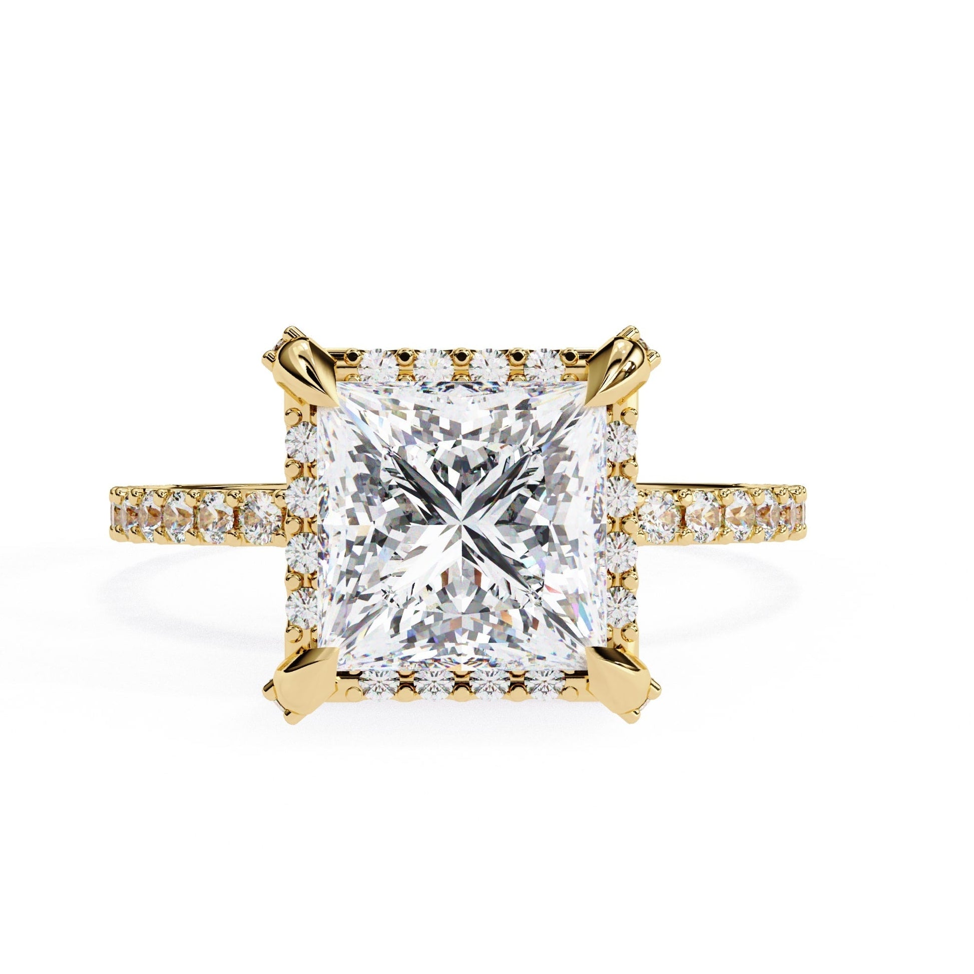 Gold ring with a large diamond and smaller diamonds on the band against a white background