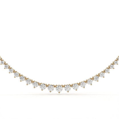 Gold and diamond necklace on a white background