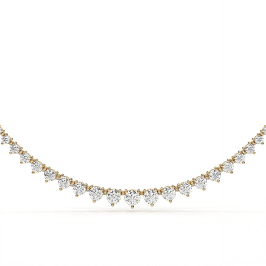 Gold and diamond necklace on a white background