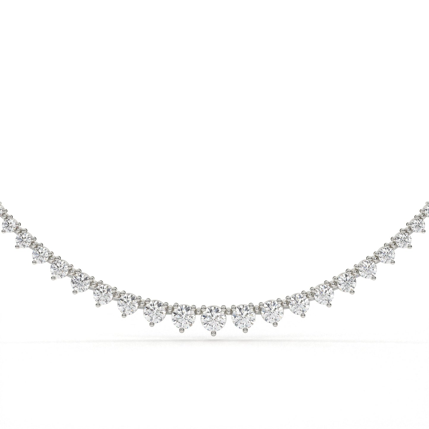Delicate silver necklace with small diamonds on a white background