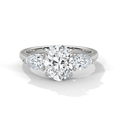 Diamond ring with a heart-shaped center stone on a white background