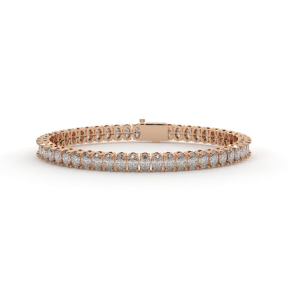Rose gold bracelet with diamonds on a white background