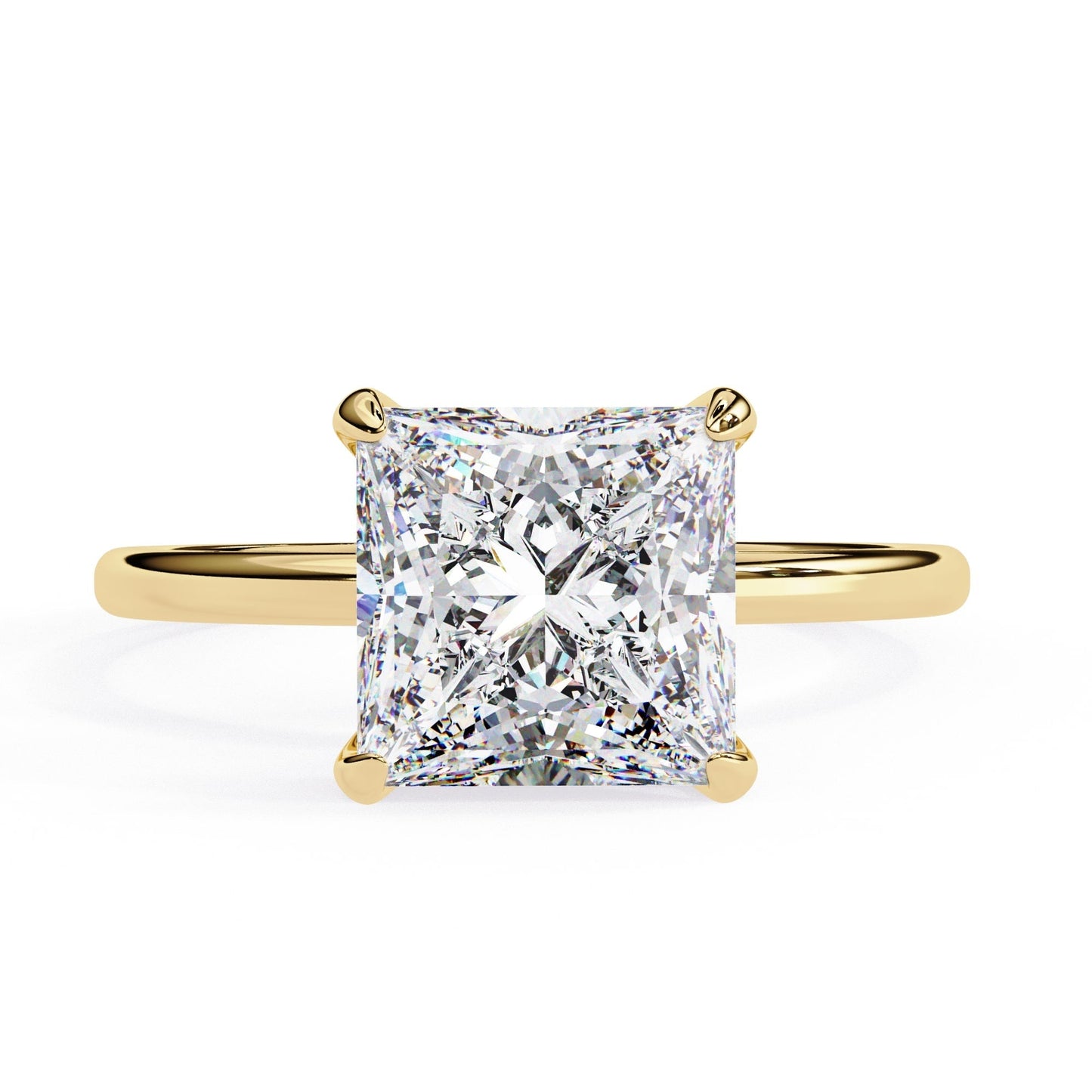 Gold ring with a large diamond on a white background
