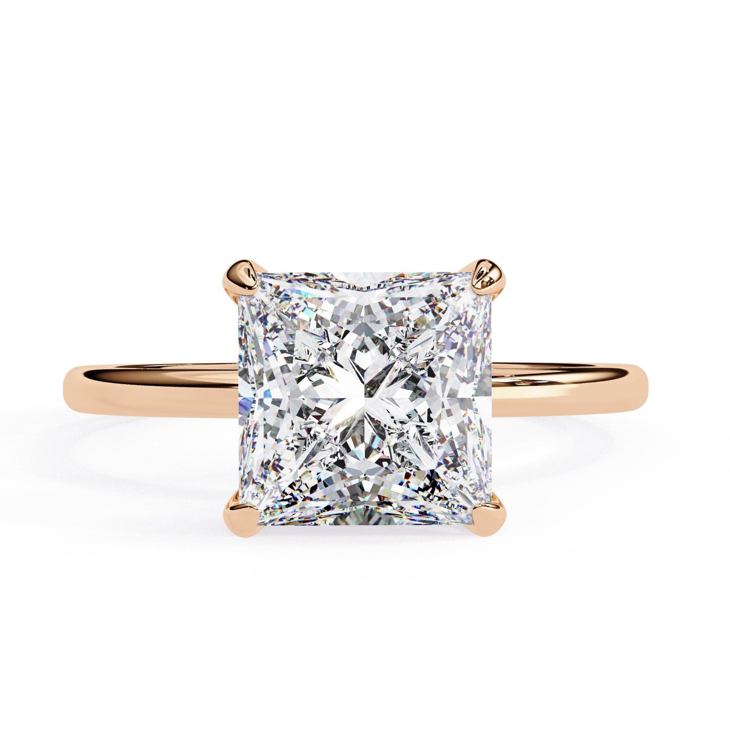 Rose gold ring with a large diamond on a white background