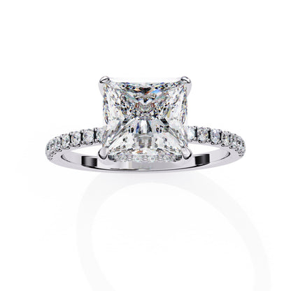 Diamond ring with a square-cut center stone on a white background