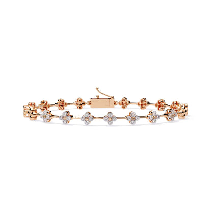 Rose gold bracelet with diamond accents on a white background