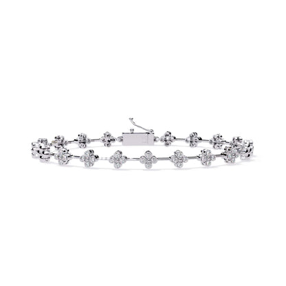 White gold bracelet with floral designs on a white background