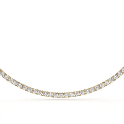Gold necklace with diamonds on a white background