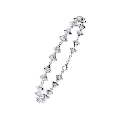 Silver bracelet with diamond-like stones on a white background