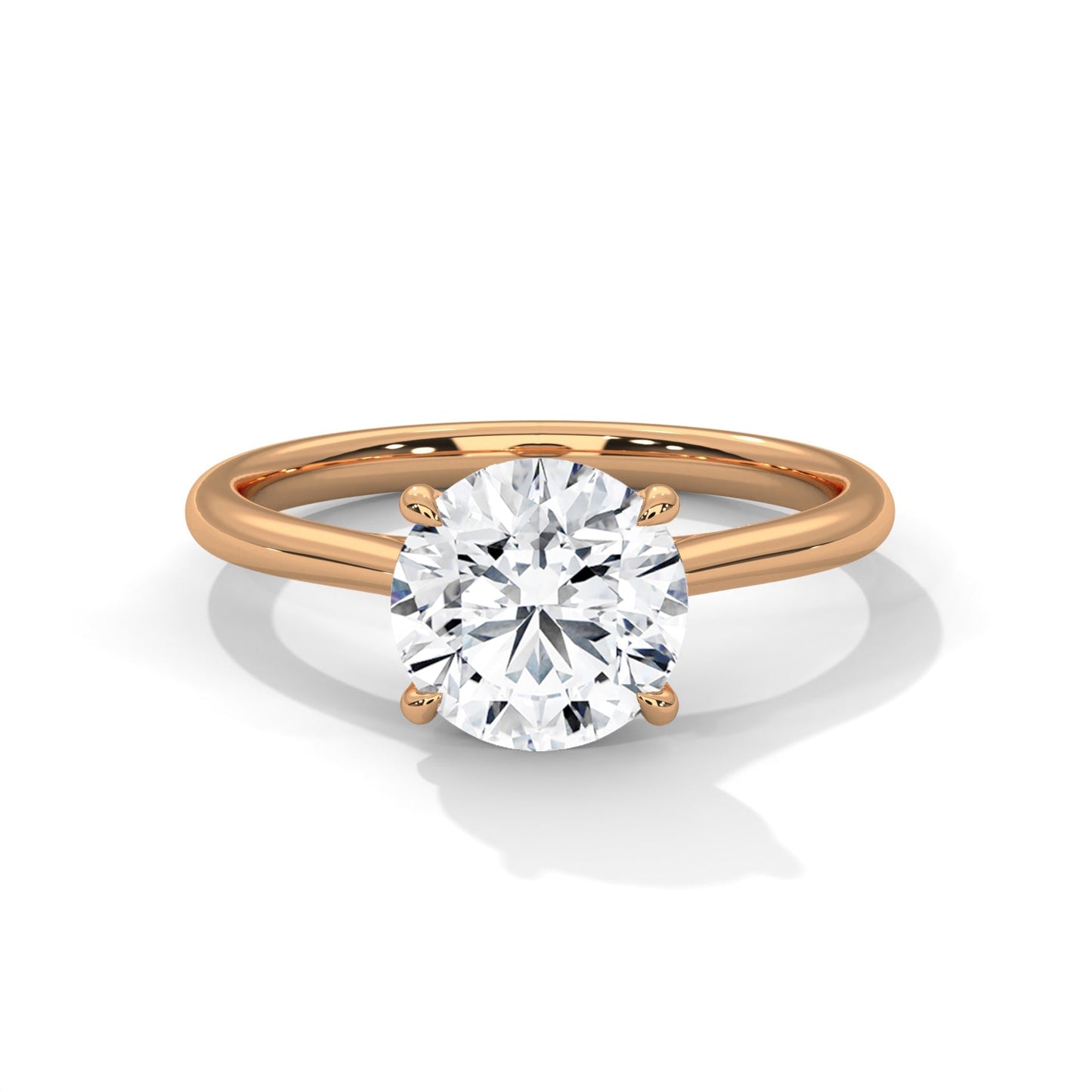 Rose gold ring with a large diamond on a white background