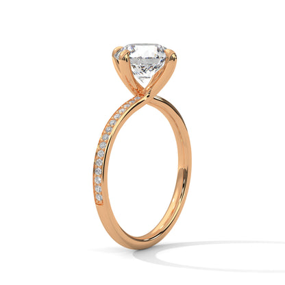 Rose gold ring with a diamond on a white background