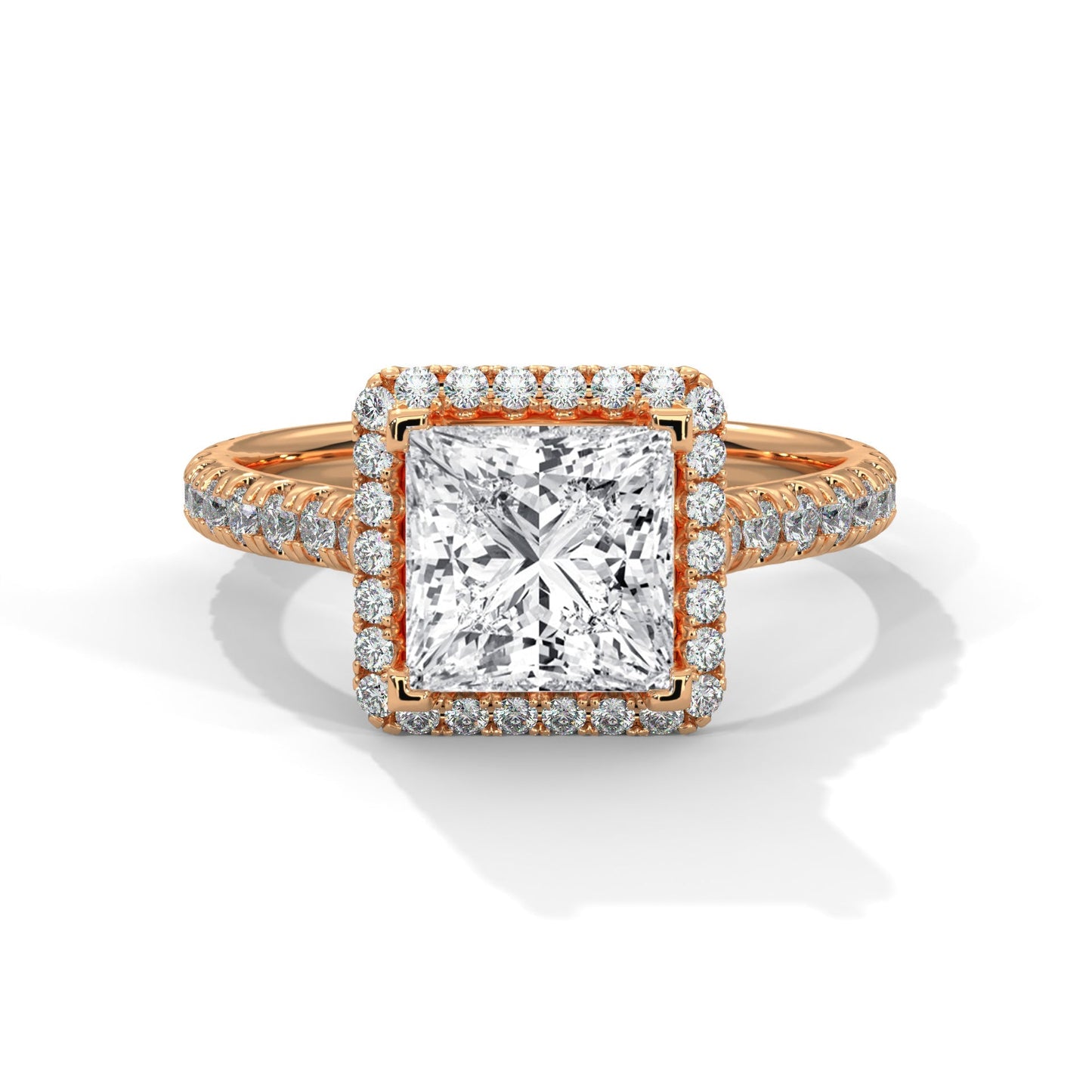 Rose gold ring with a large diamond and smaller diamonds on the band against a white background