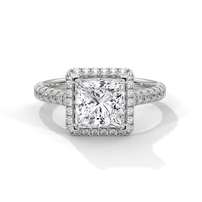 Diamond ring with a square-cut center stone on a white background