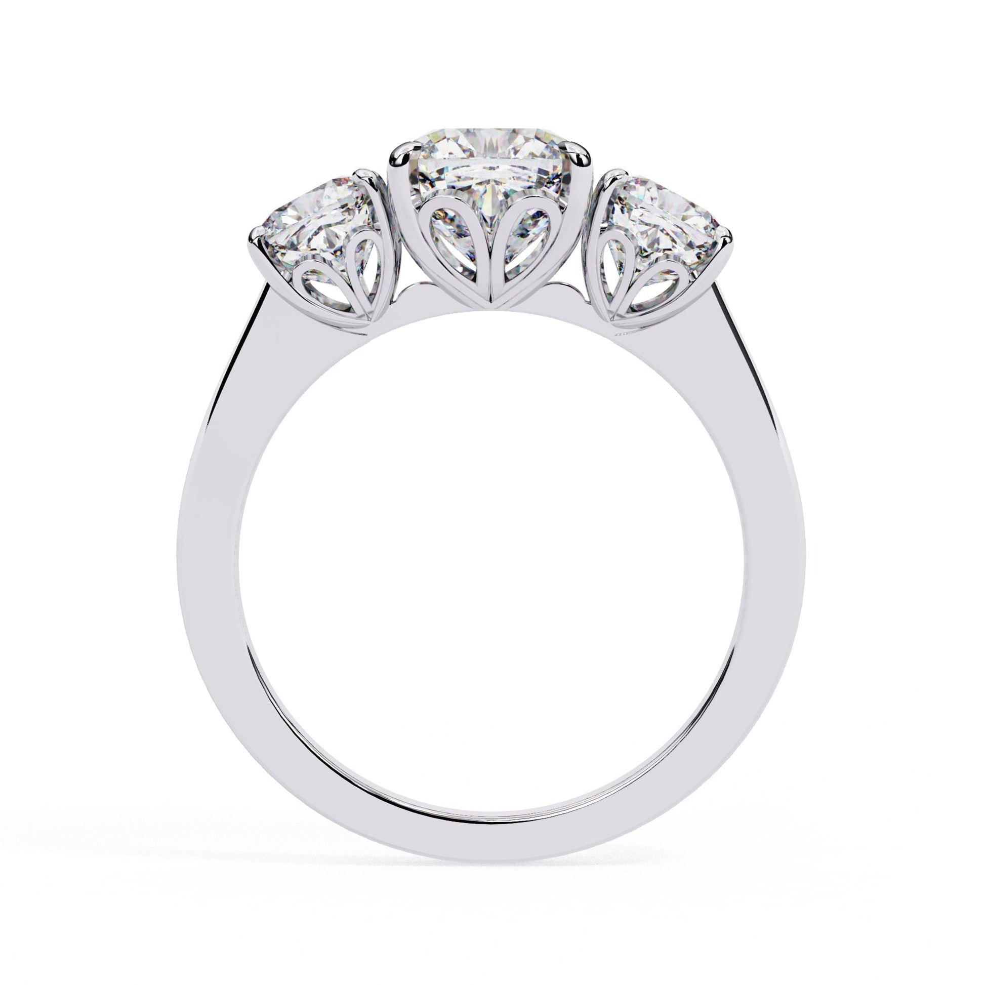 Three-stone diamond ring on a white background