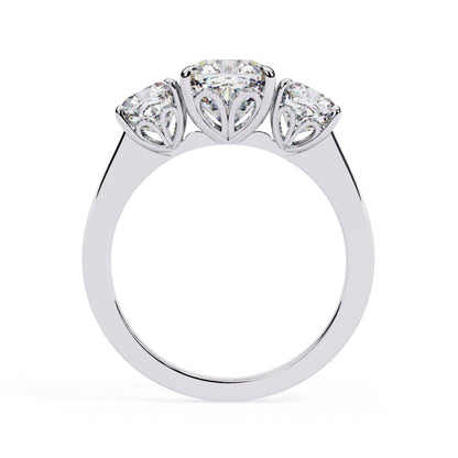 Three-stone diamond ring on a white background