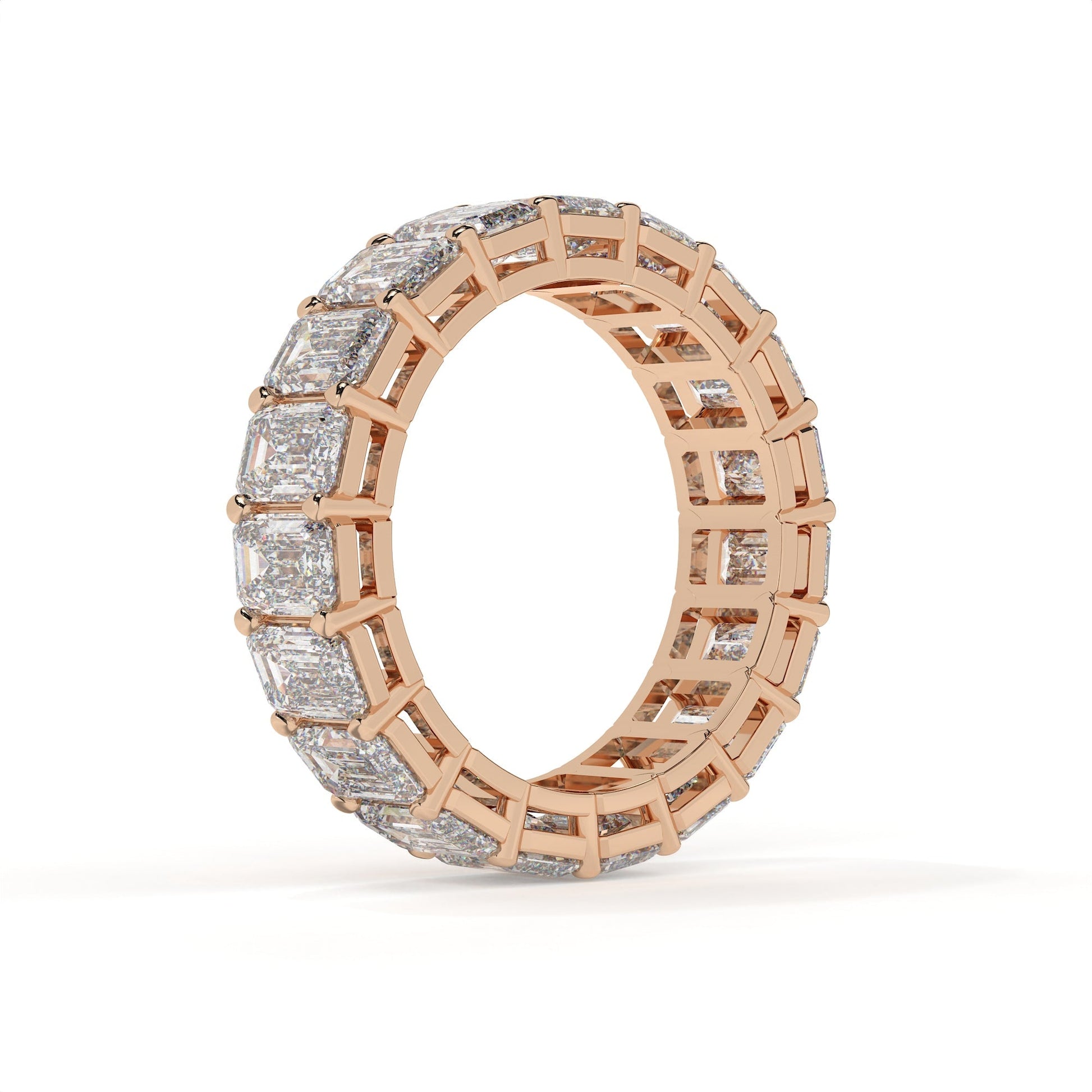 Rose gold ring with diamond accents on a white background