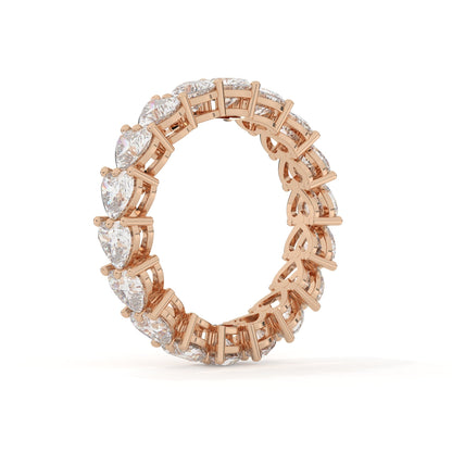 Rose gold ring with diamonds on a white background