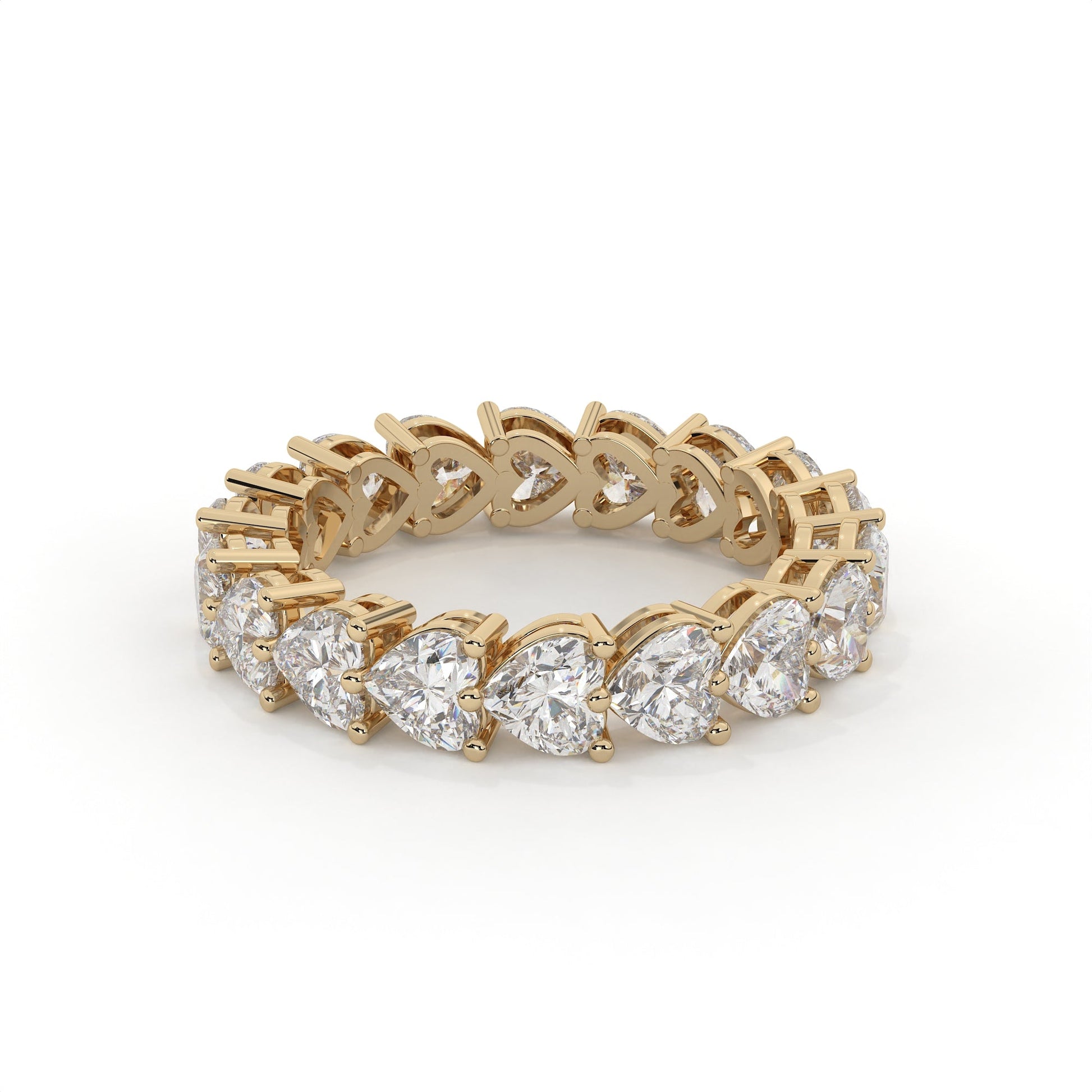 Gold ring with diamond stones on a white background